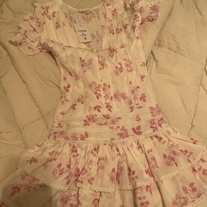 Yvonne & Love- pleated white dress with pink floral design and pearl buttons